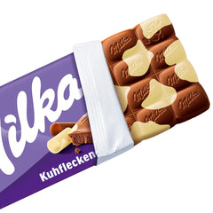 Milka Cow Spots – alpská mléčná čokoláda s bílou čokoládou v designu cow spot – 24 x 90g