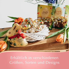 Lindt Chocolate Gold Bunny Lucky Charm Edition | 100 g | Zlatá mléčná čokoláda s velikonočním vzorem Lucky Charm | Velikonoční čokoláda | Čokoládový dárek | Čokoládový zajíček | Velikonoční zajíček