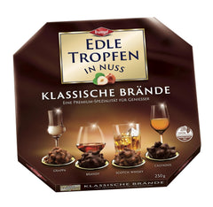 Jemné kapky v brandies klasické ořechy 250 g tekuté čokoládové pralinky s polevou z mléčné čokolády a křupavými kousky lískových oříšků