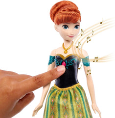 Păpușa Mattel Disney Frozen Singing Anna - fragment de cântec de 30 de secunde, ținută clasică de castel, fustă moale detașabilă, păr pieptănabil, pentru copii cu vârsta de 3 ani și peste, versiune germană, HMG41