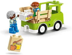 LEGO DUPLO Městské včelaření a úly, vzdělávací hračka pro batolata se 2 figurkami a pojízdným vozíkem, sada na stavění a přestavování, hračka pro batolata od 2 let 10419 stavebnice Besuche den LEGO-Store