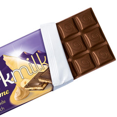 Milka Black Milk – alpská černá čokoláda s mléčnou a krémovou nugátovou náplní – 85g