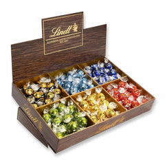 Lindt čokoláda LINDOR, pultový displej | 1718 g | Přibl. 138 lanýžů v odrůdách Milk, Black 70%, Polohnědé, Stracciatella, White, Pistácie | Čokoládová dárková sada | Dárková čokoláda | Hromadný balíček