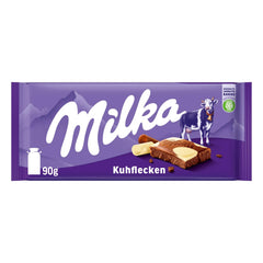 Milka Cow Spots – alpská mléčná čokoláda s bílou čokoládou v designu cow spot – 24 x 90g