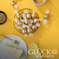 Lindt Čokoláda | LINDOR Cheesecake Bag | 1 kg | 80 kuliček z bílé mléčné čokolády s tvarohovou náplní rozplývající se v ústech | Dárek čokolády ke sdílení