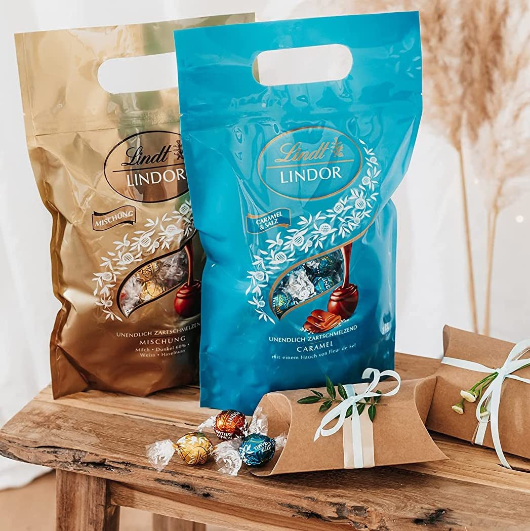 LINDOR čokoládové kuličky | 1 kg uzavíratelný sáček | cca. 80 kuliček z mléčné čokolády s mátovou náplní | Hromadné balení a čokoládové kuličky se slaným karamelem LINDOR