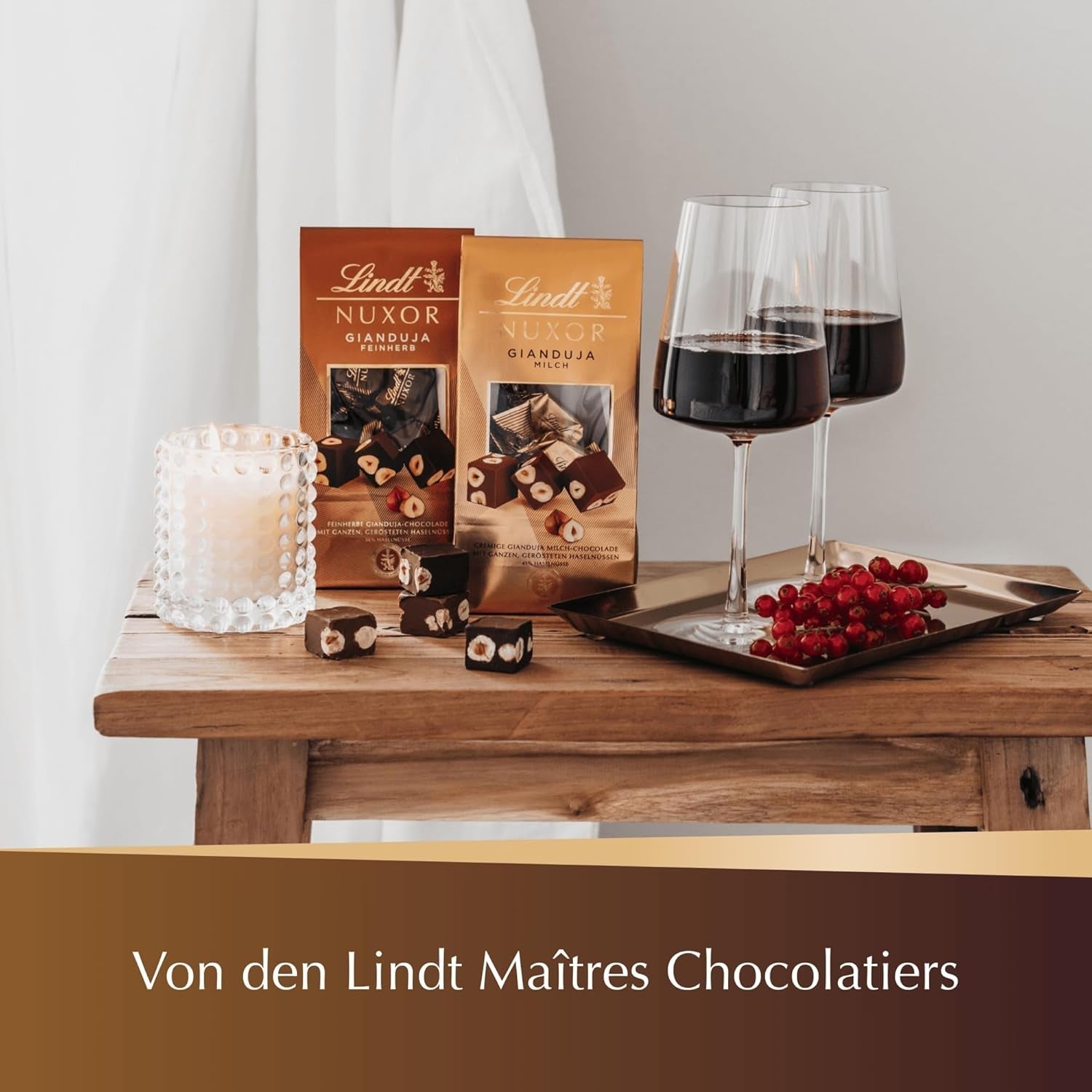 Lindt NUXOR, Gianduja cremoasă (cu lapte și neagră) cu alune prăjite întregi, 206 grame Bomboane de Ciocolata Naty Shop