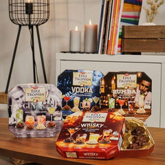 Edle Tropfen v Nuss Vodka Lounge 100g, tekuté čokoládové pralinky s polevou z mléčné čokolády a křupavými kousky lískových oříšků