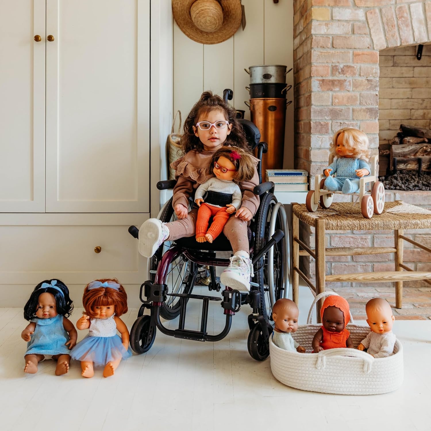 Păpușă Miniland Baby, băiat african, 32 cm, anatomic corect