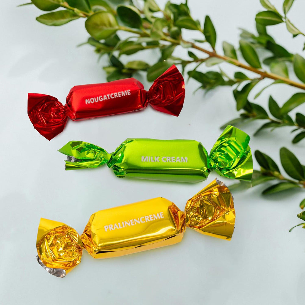 Dárková krabička na velikonoční přání Heidel 183g, prémiová pralinka z mléčné čokolády s ozdobnou kovovou krabičkou, ideální jako velikonoční dárek