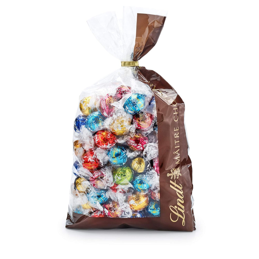 Čokoládová směs LINDOR | 1371 g | Přibl. 109 kuliček: Mléčná čokoláda a kuličky LINDOR s jahodovým krémem | 1 kg pytel, cca. 80 čokoládových kuliček bílá čokoláda s jahodovým krémem