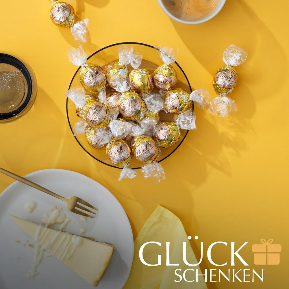 Lindt Čokoláda | LINDOR Cheesecake Bag | 1 kg | 80 kuliček z bílé mléčné čokolády s tvarohovou náplní rozplývající se v ústech | Dárek čokolády ke sdílení