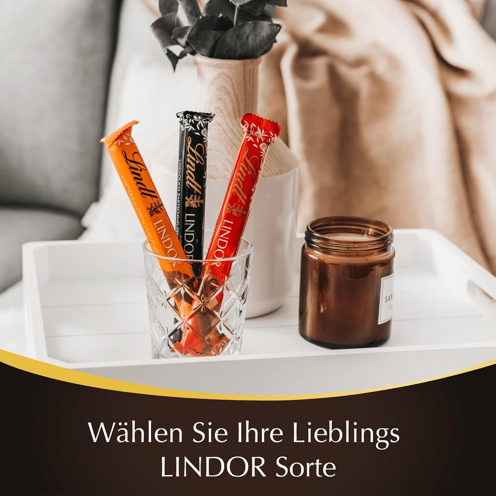 Lindt Čokoláda | Tyčinky LINDOR 60% Kakao | 100 g | 4 čokoládové tyčinky s hořkou čokoládou 60% kakaa a náplní rozplývající se v ústech | Čokoládová tyčinka