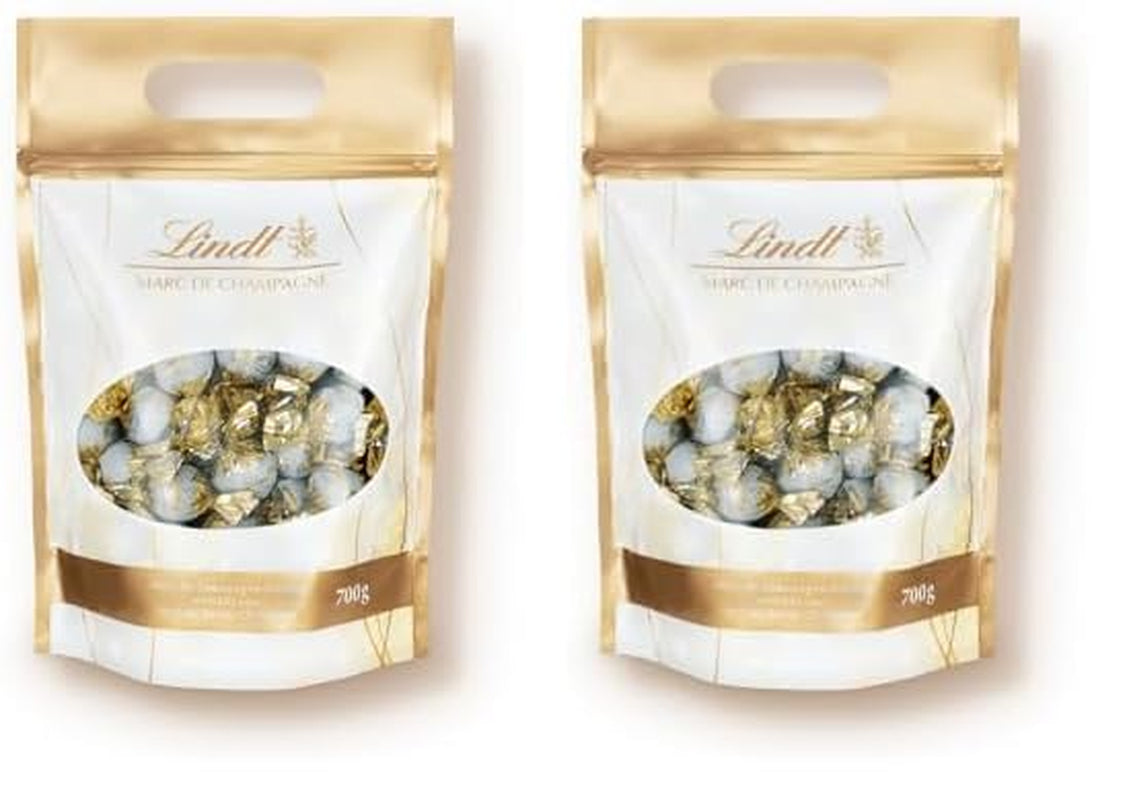 Čokoládové kuličky Lindt Marc de Champagne | 700 g Přibl. 56 bonbonů z mléčné čokolády s rafinovanou náplní, obsahuje alkohol | Hromadné balení | Čokoládový dárek | Čokoládový dárek