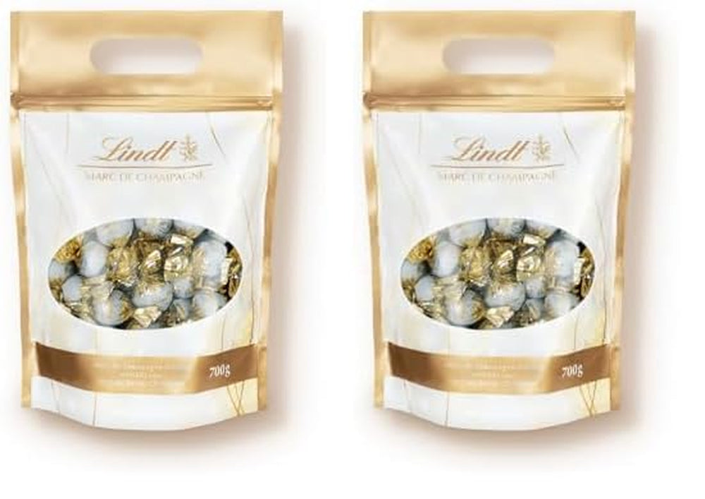 Čokoládové kuličky Lindt Marc de Champagne | 700 g Přibl. 56 bonbonů z mléčné čokolády s rafinovanou náplní, obsahuje alkohol | Hromadné balení | Čokoládový dárek | Čokoládový dárek