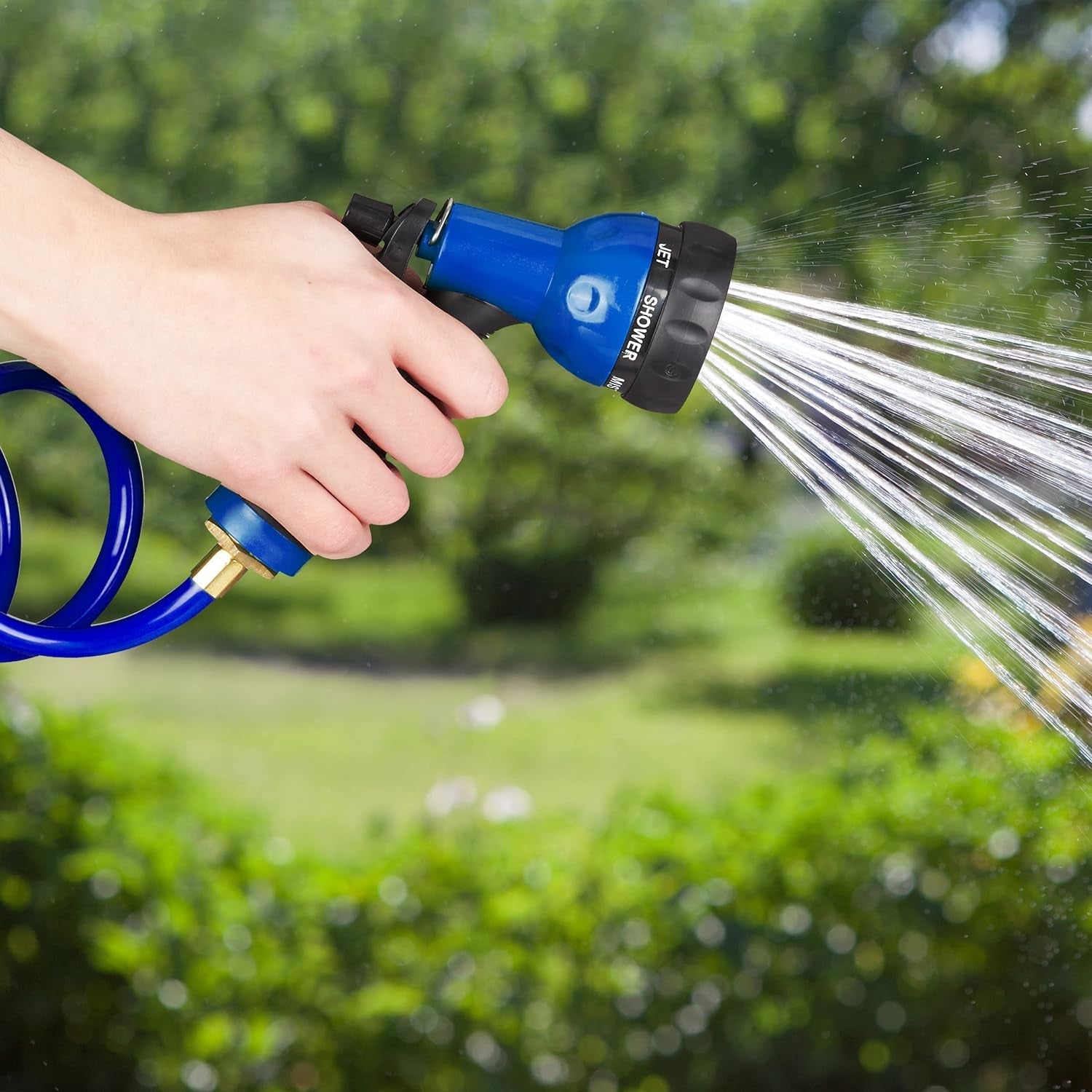 Furtun spiralat Relaxdays, extensibil până la 10 m, furtun flexibil de grădină cu pulverizator de apă, 7 modele de pulverizare, albastru, 25 x 52 x 15 cm