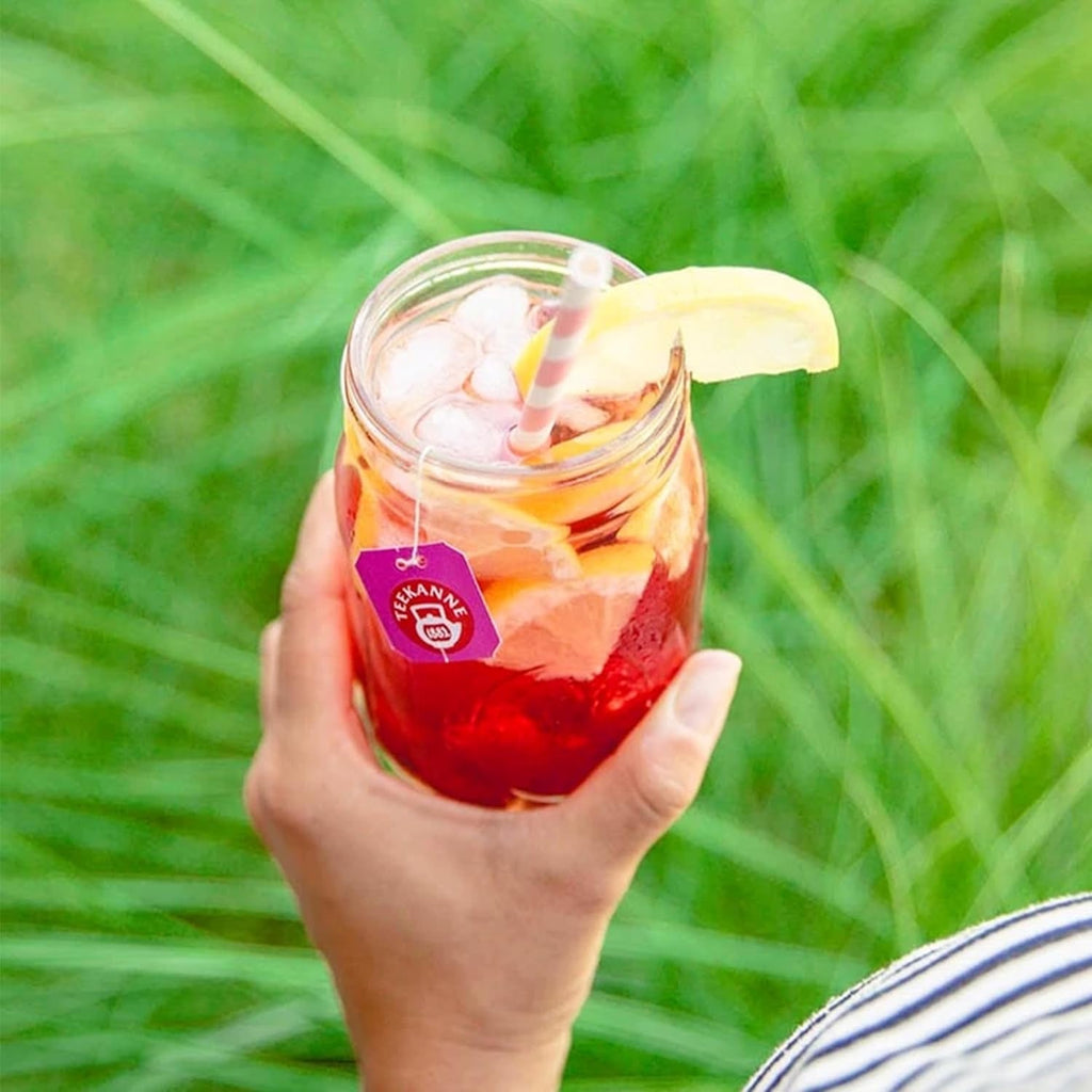 Ceai Teekanne Frio în pachet de 6 fructe, sortimente: zmeură-lămâie, coacăze-lămâie, piersică-maracuja, rubarbă-cireșe, ceai rece lămâie &amp; piersică, câte 18 pliculețe de 2,5 g fiecare