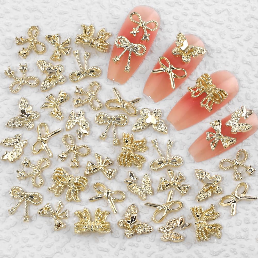 50Stück 3D Gold Bow Nail Charms Butterfly Nail Art Charms Legierung Bogen Nagel Charms Nägel Zubehör Schleife Nagelschmuck Metall Schleifen Schmetterling Nageldesign Nagelanhänger Nailart Strasssteine