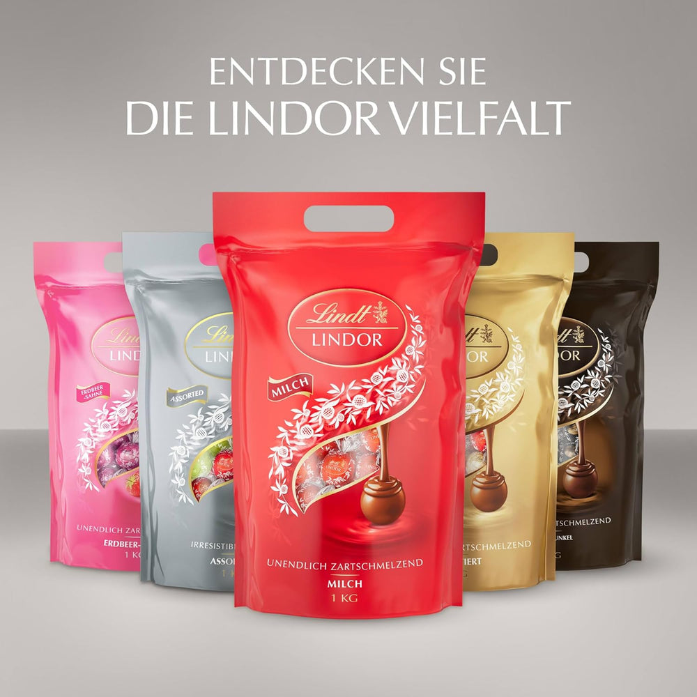 Lindt Čokoláda | Rozmanitá taška LINDOR stříbrná | 1 kg pytel | 80 mléčných čokoládových kuliček rozpouštějících se v ústech, 70%, příchuť slaný karamel a dvojitá čokoláda | Dárek čokolády ke sdílení