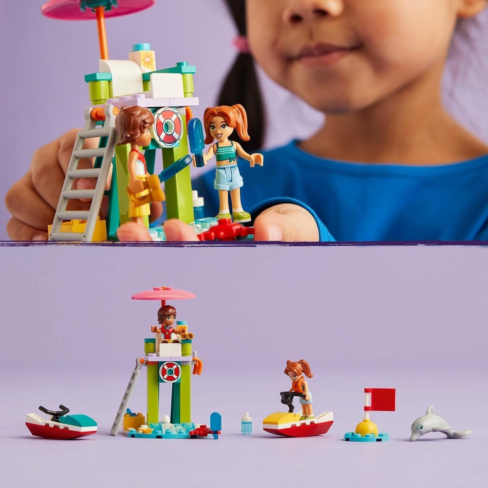 LEGO Friends plavčíková vyhlídková věž s vodními skútry, dětská hračka, tip na dárek pro dívky a chlapce od 5 let se 2 figurkami a delfínem, hračka pro vodní skútry 42623 Stavebnice Besuche den LEGO-Store
